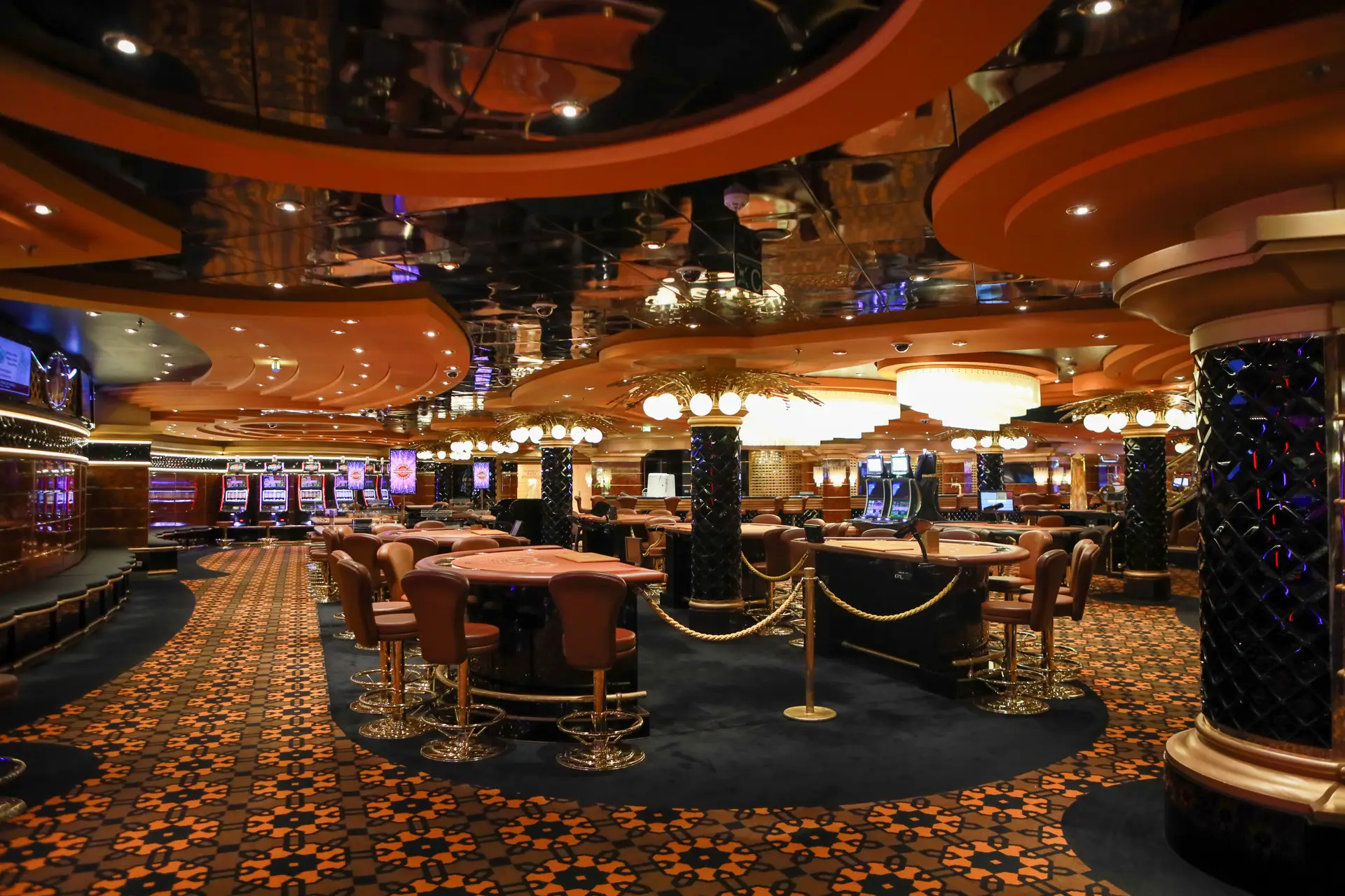 Lavish Quorvellagrandhaven casino gaming floor under elegant lighting