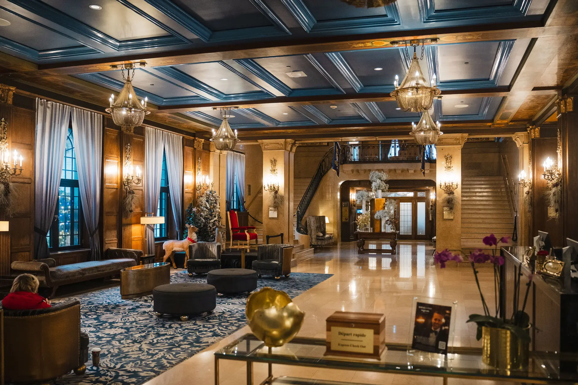 Luxurious casino hotel lobby with grand chandeliers