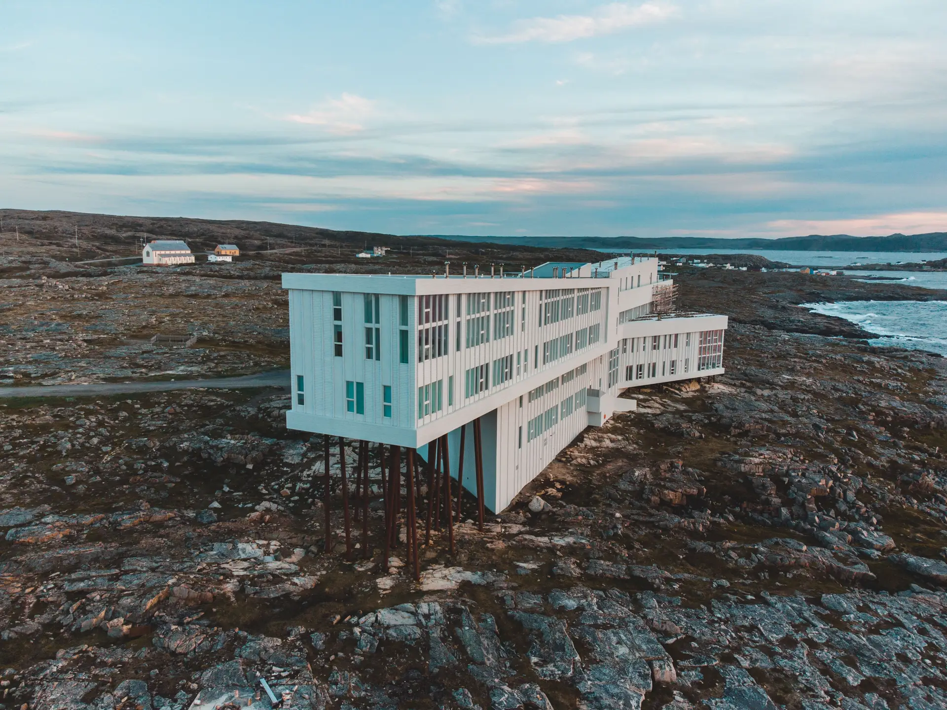 Modern architectural facade of Quorvellagrandhaven at dusk